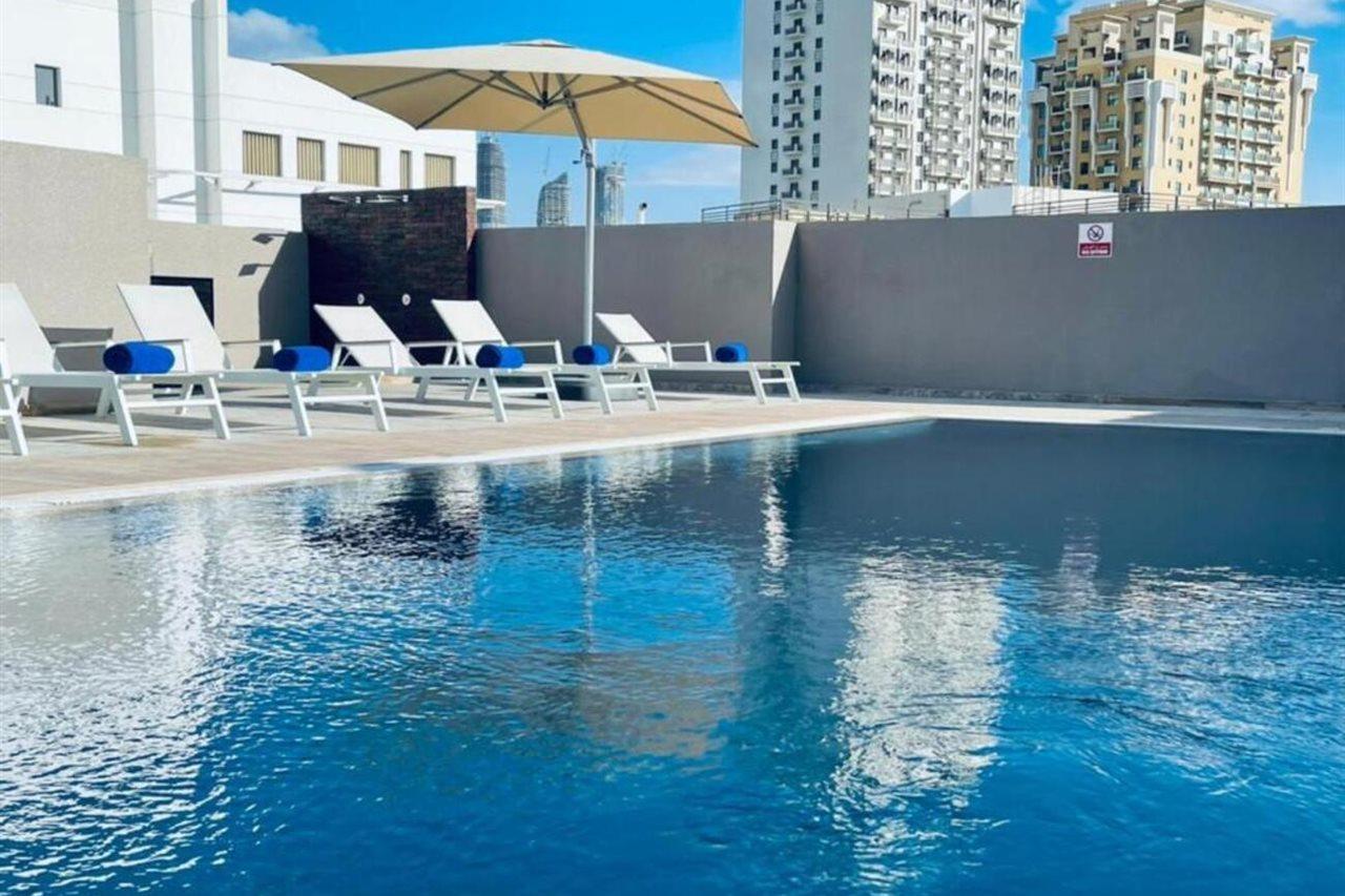 Готель Grand Kingsgate Jaddaf Waterfront By Millennium 4*